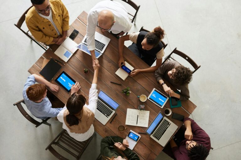 team discussing client solutions in a modern office